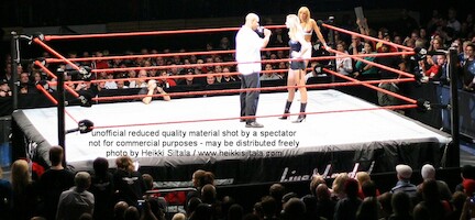 Jonathan Coachman & Stacy Keibler · WWE RAW Live & Loaded · photo 17